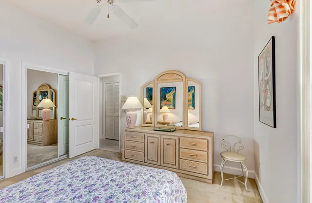 a bedroom with a bed and a view of bathroom