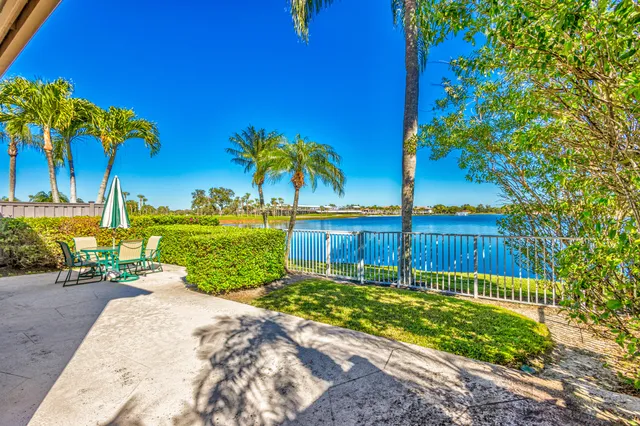 a view of a chairs and table in the patio