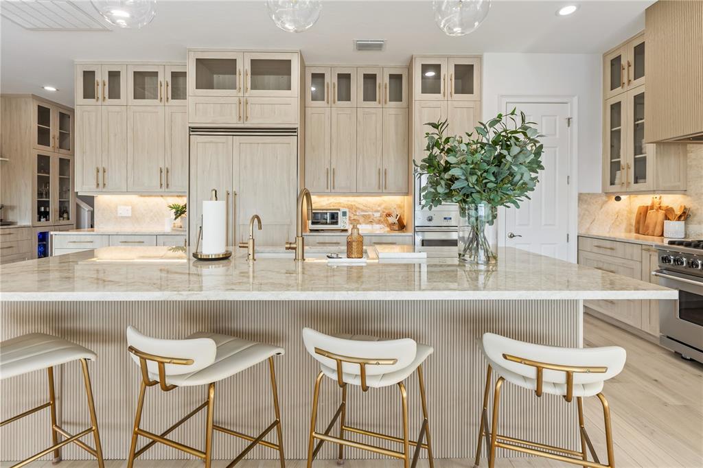 8008 Midnight Pass Road Sarasota, FL 34242 - Photo 11 of 61 a kitchen with a table and chairs in it