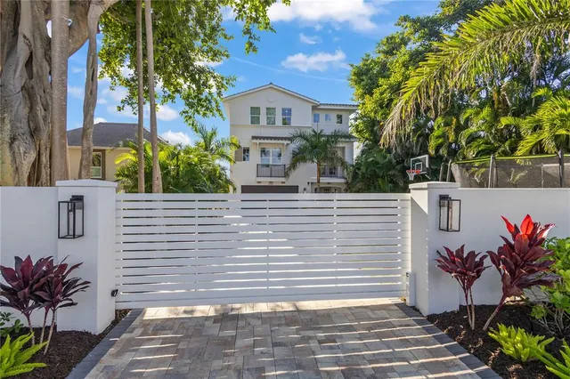 a view of a house with a street