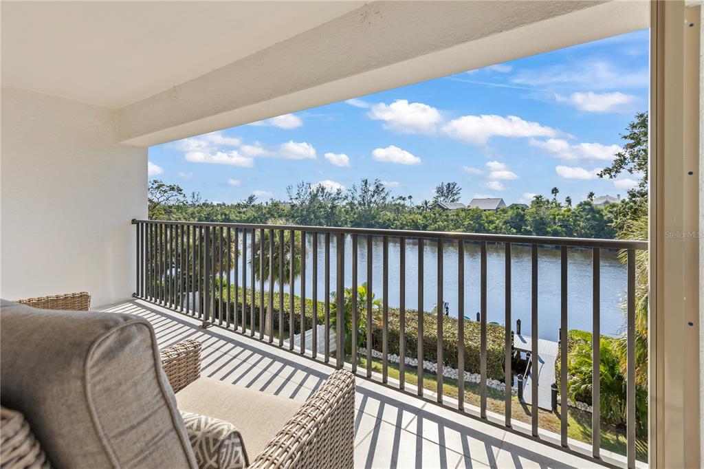 8008 Midnight Pass Road Sarasota, FL 34242 - Photo 39 of 61 a balcony with street view