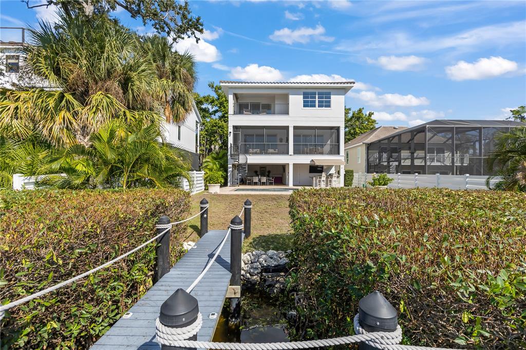 8008 Midnight Pass Road Sarasota, FL 34242 - Photo 53 of 61 a house view with a garden space