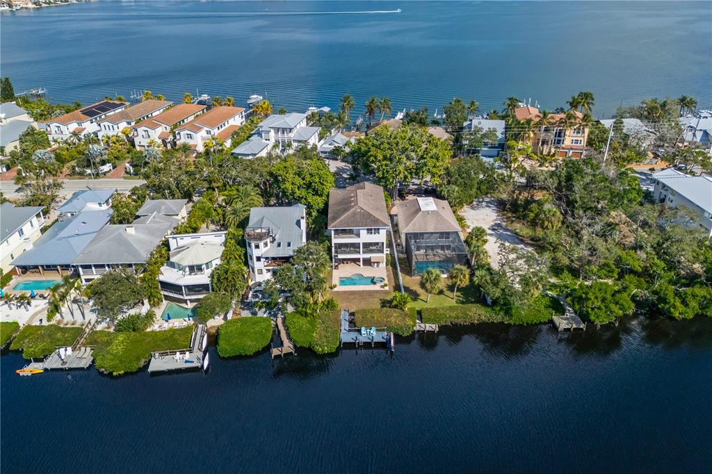 8008 Midnight Pass Road Sarasota, FL 34242 - Photo 60 of 61 a picture of a lake with a building in the background