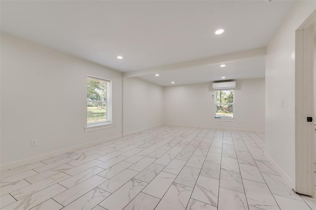 13827 Hiram Road Wills Point, TX 75169 - Photo 33 of 39 an empty room with windows