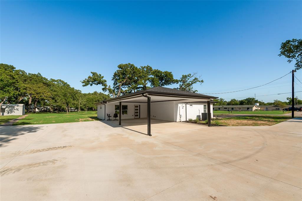 13827 Hiram Road Wills Point, TX 75169 - Photo 4 of 39 a view of a house with a yard