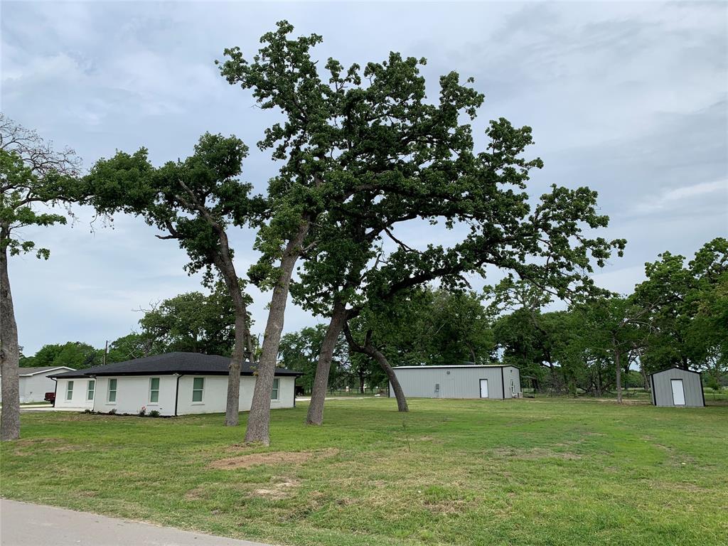 13827 Hiram Road Wills Point, TX 75169 - Photo 6 of 39 a view of a house with a yard