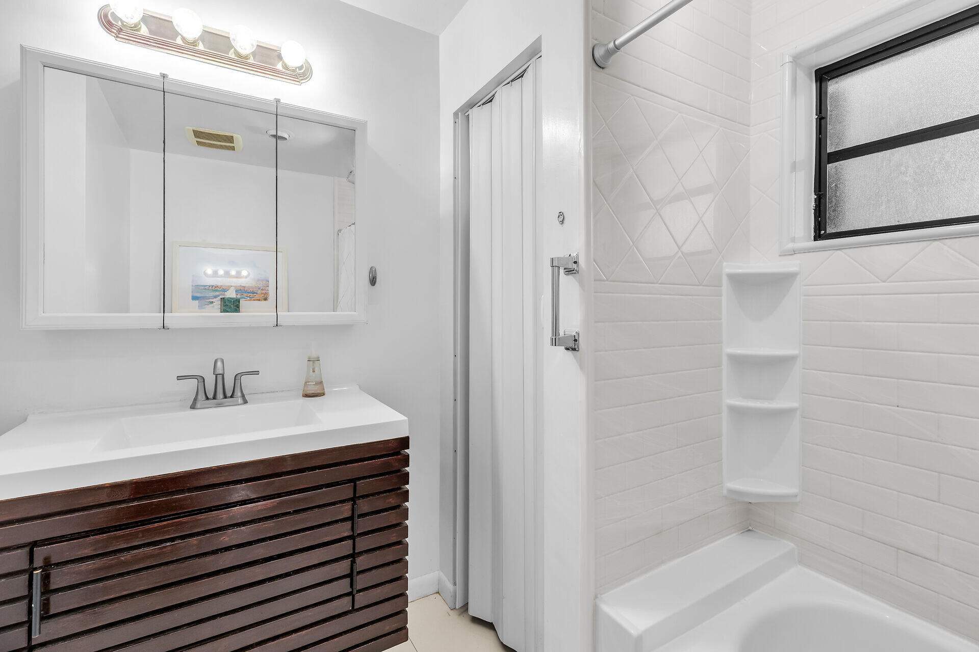 1044 Gibraltar Road Key Largo, FL 33037 - Photo 18 of 29 a bathroom with a sink a toilet and shower