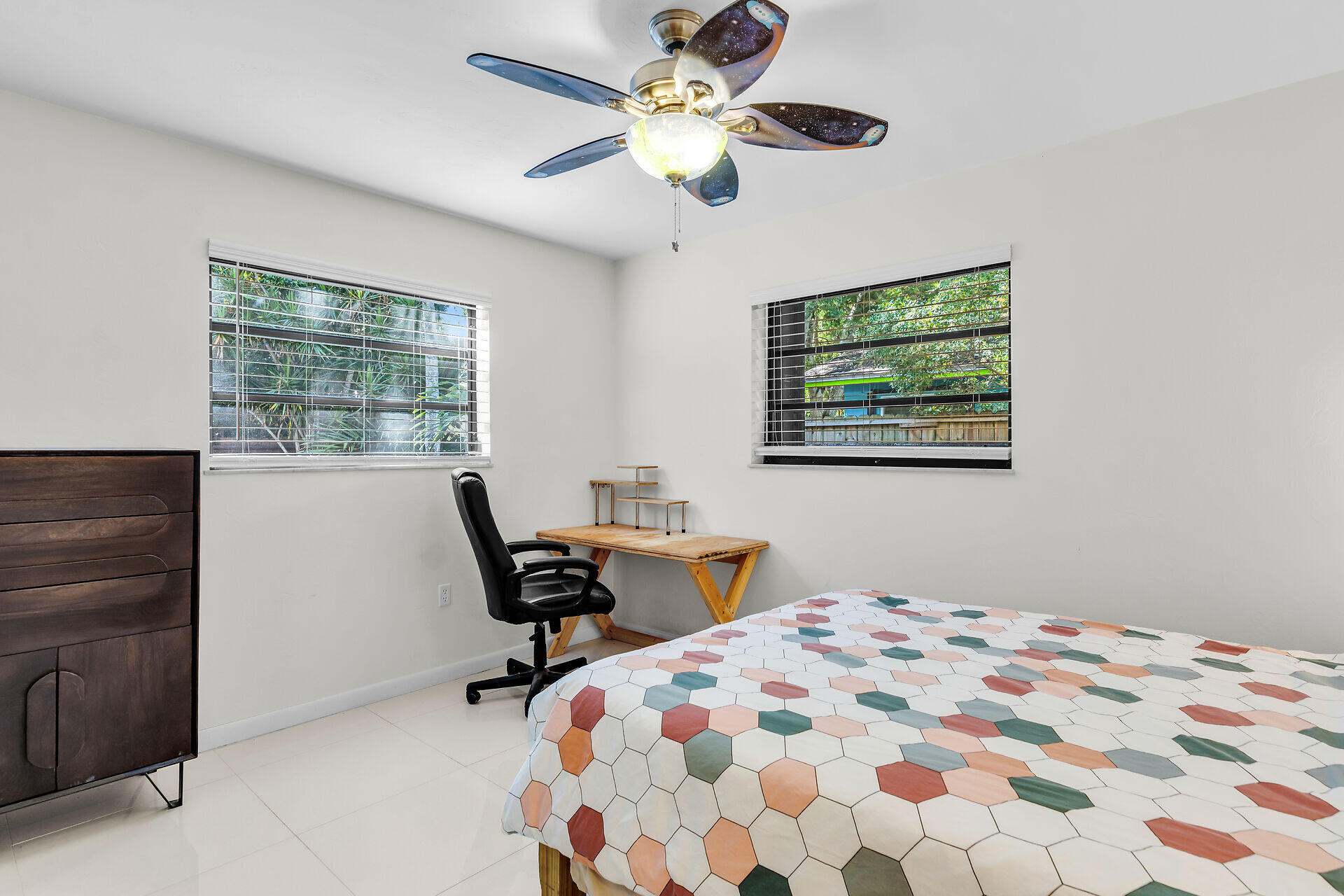 1044 Gibraltar Road Key Largo, FL 33037 - Photo 19 of 29 a bedroom with a bed and a window