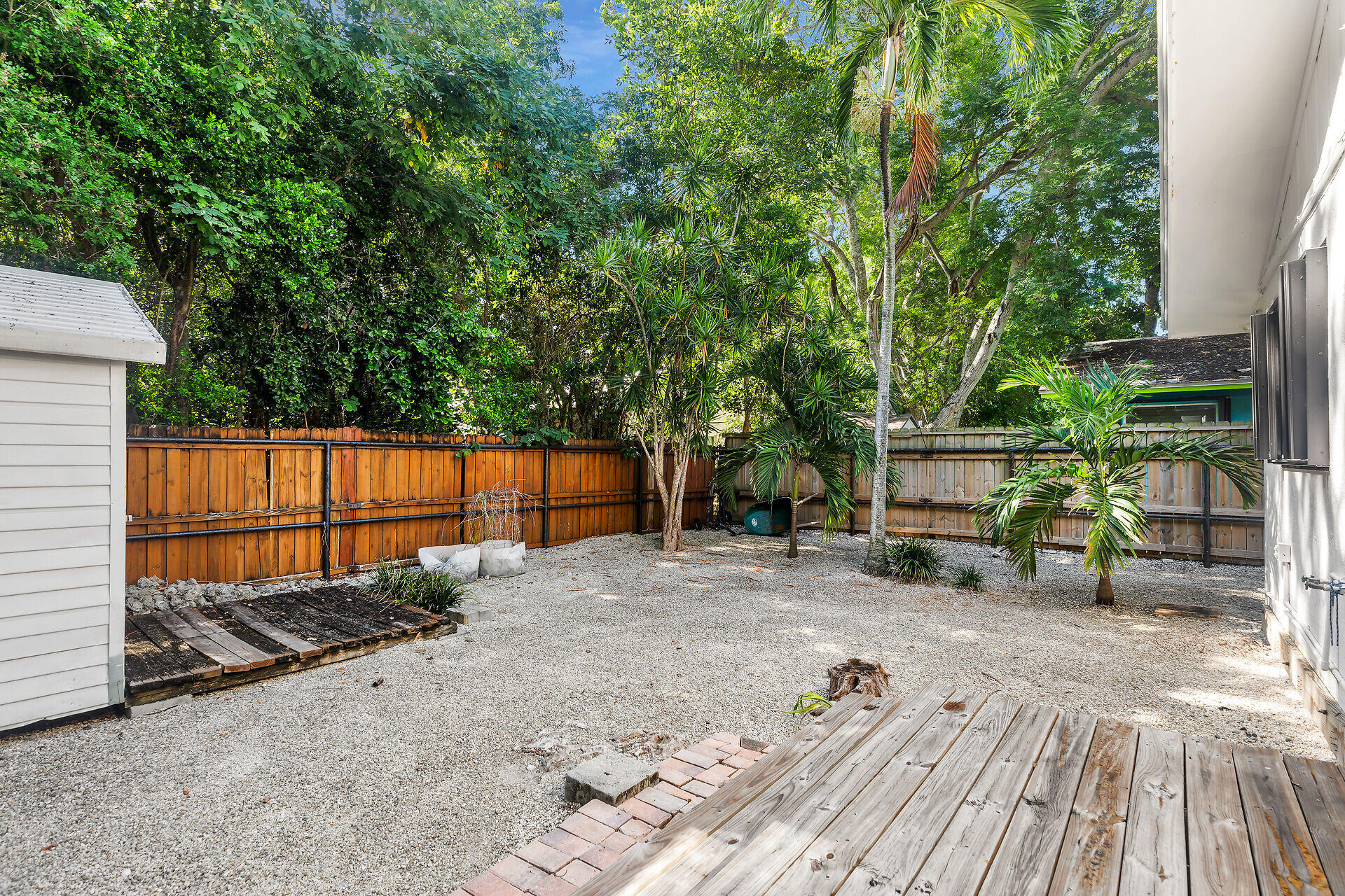 1044 Gibraltar Road Key Largo, FL 33037 - Photo 23 of 29 a backyard of a house with seating space