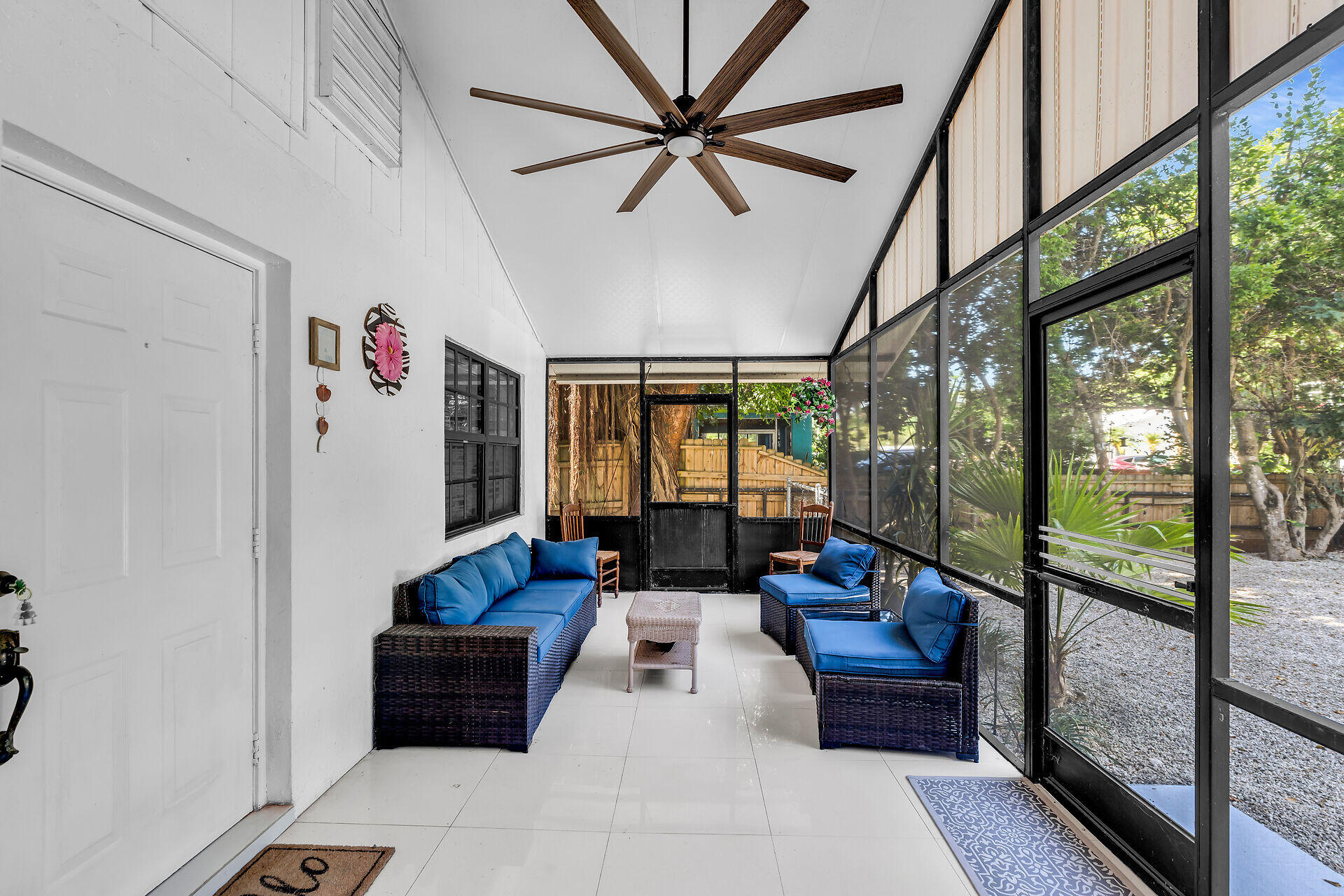 1044 Gibraltar Road Key Largo, FL 33037 - Photo 3 of 29 a living room with furniture and a large window