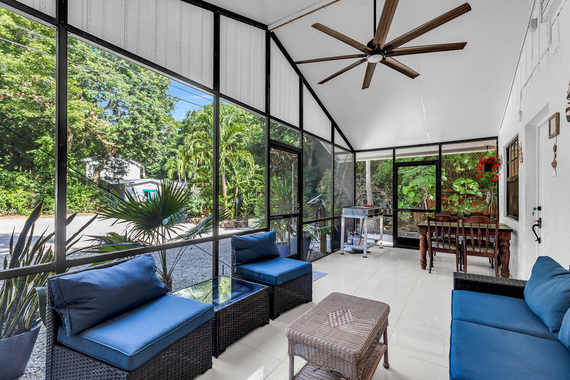 1044 Gibraltar Road Key Largo, FL 33037 - Photo 4 of 29 a living room with furniture and a floor to ceiling window