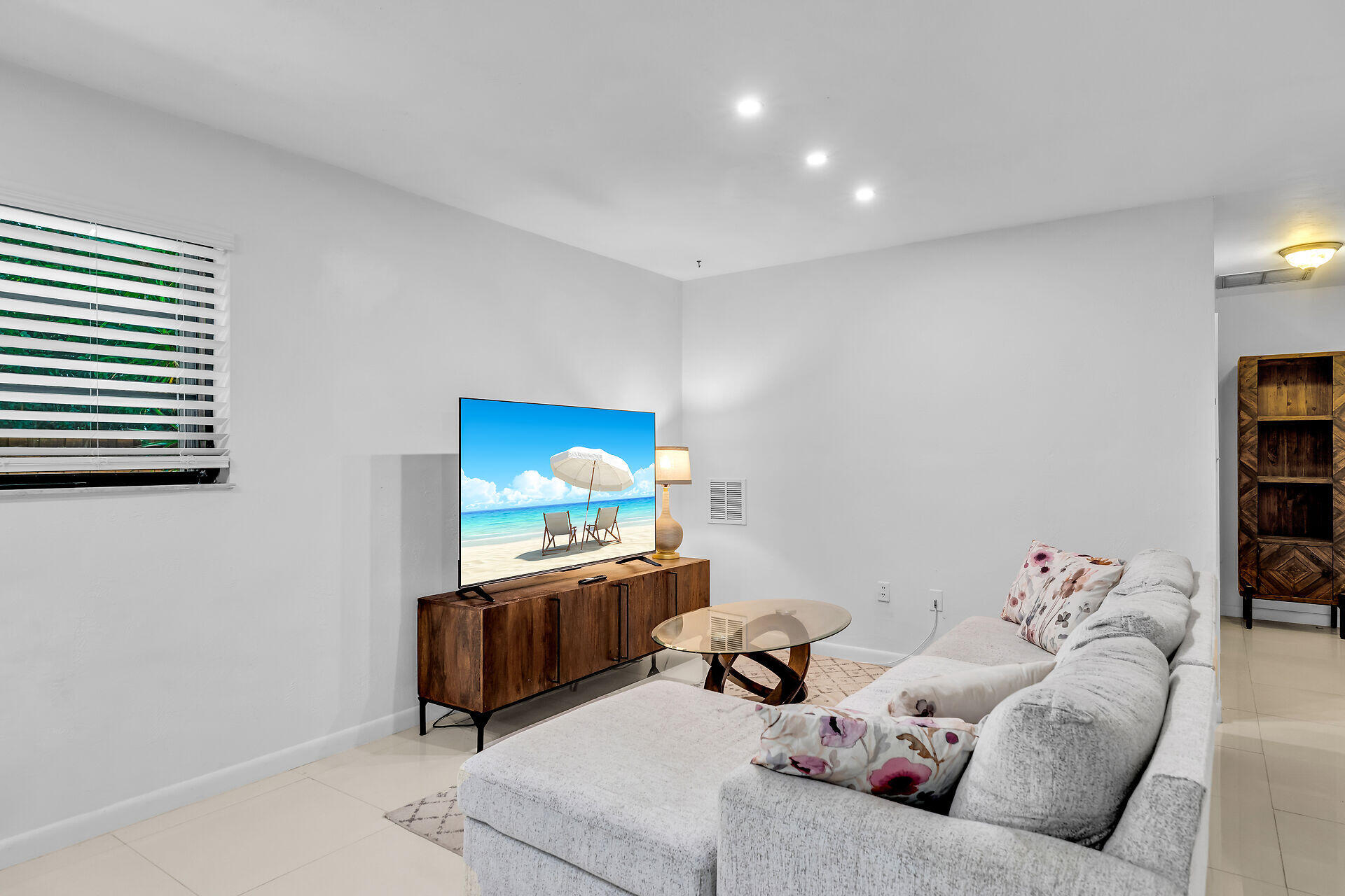 1044 Gibraltar Road Key Largo, FL 33037 - Photo 7 of 29 a living room with furniture and a flat screen tv