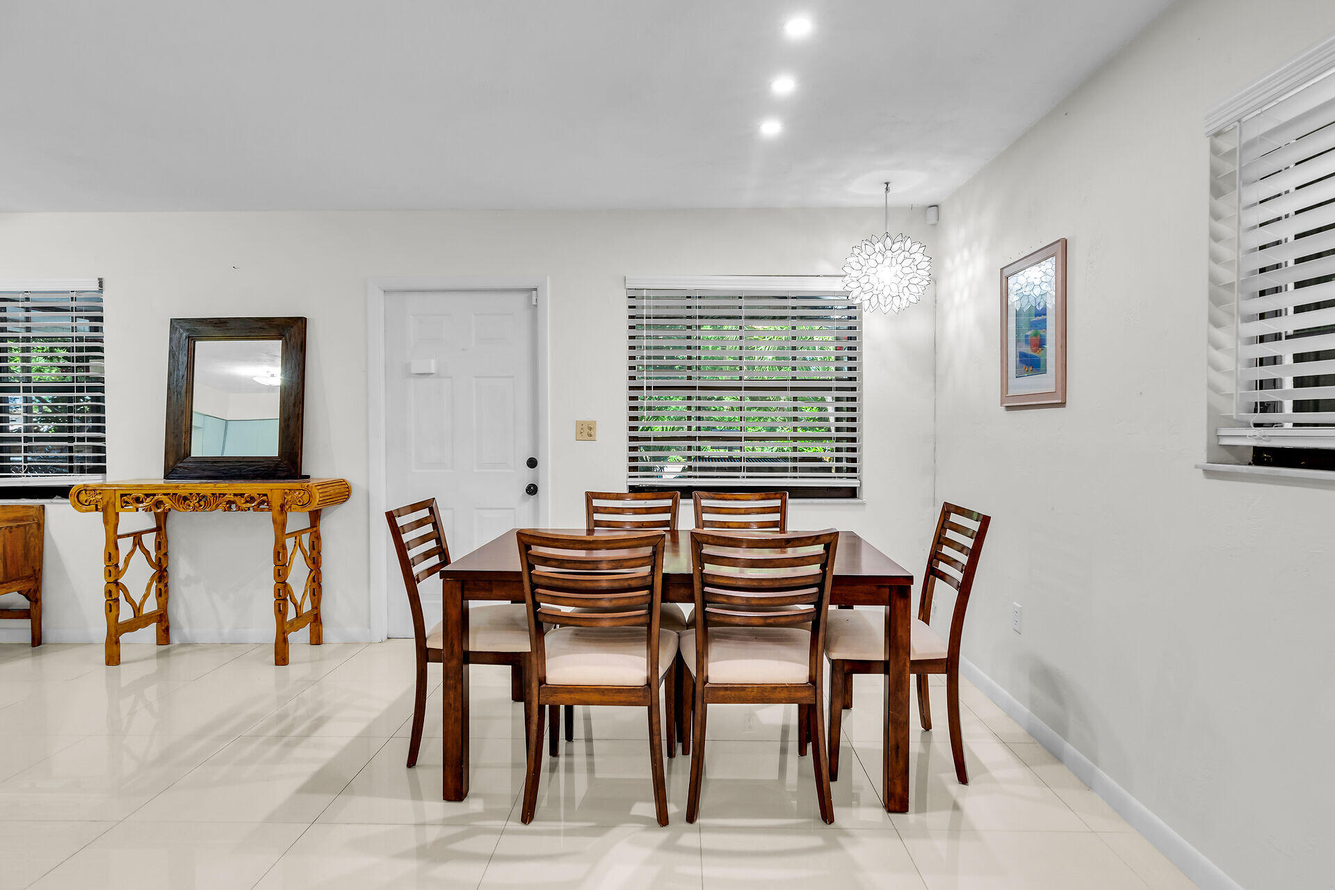 1044 Gibraltar Road Key Largo, FL 33037 - Photo 9 of 29 a dining room with furniture and window