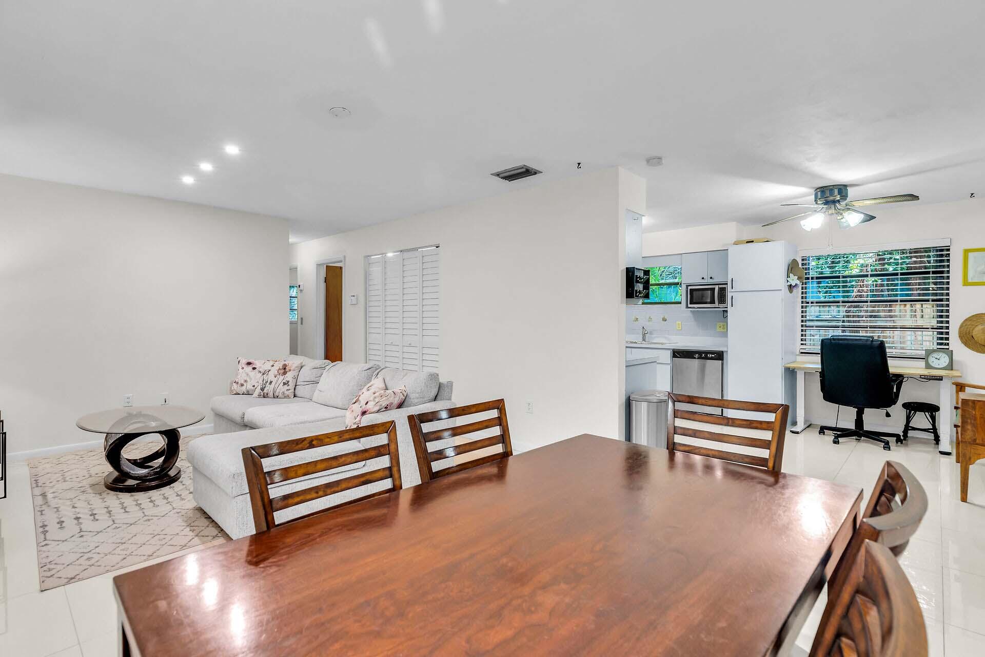 1044 Gibraltar Road Key Largo, FL 33037 - Photo 10 of 29 a living room with furniture and a flat screen tv