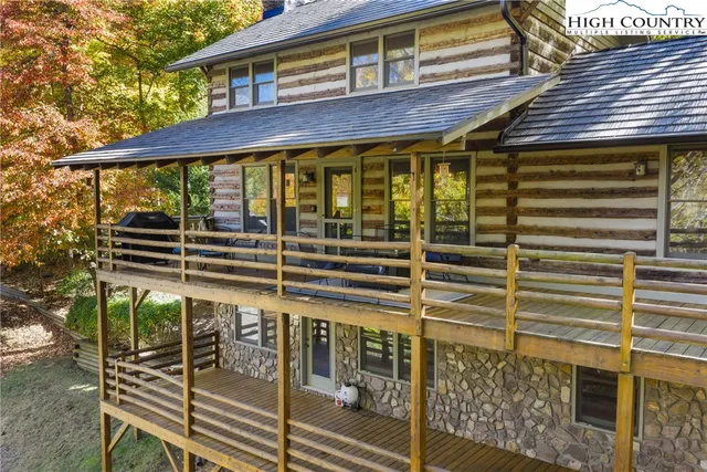 a view of a brick house with a large windows