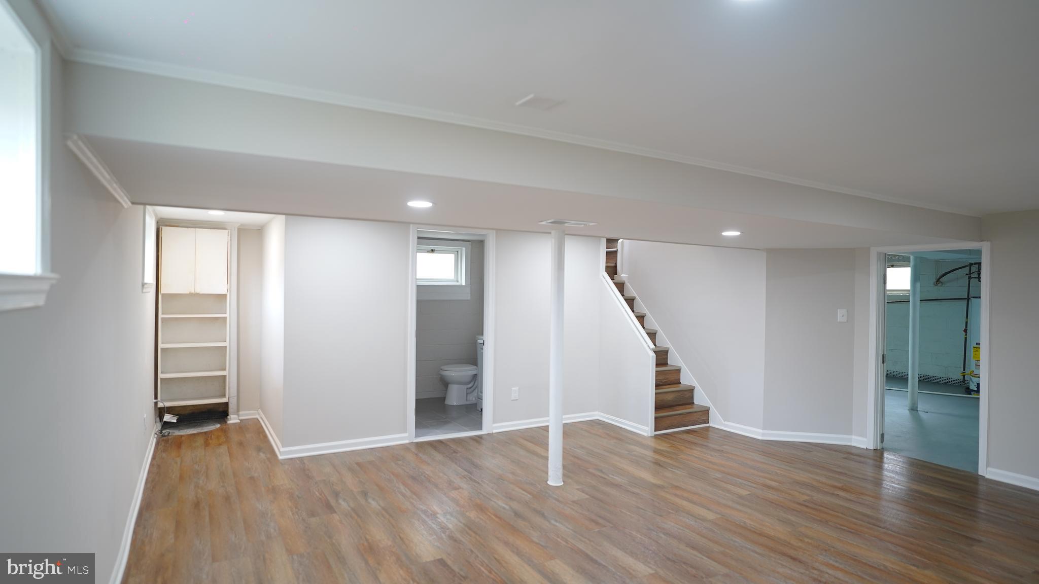9300 Worrell Avenue Lanham, MD 20706 - Photo 24 of 63 a view of entryway with wooden floor and stairs