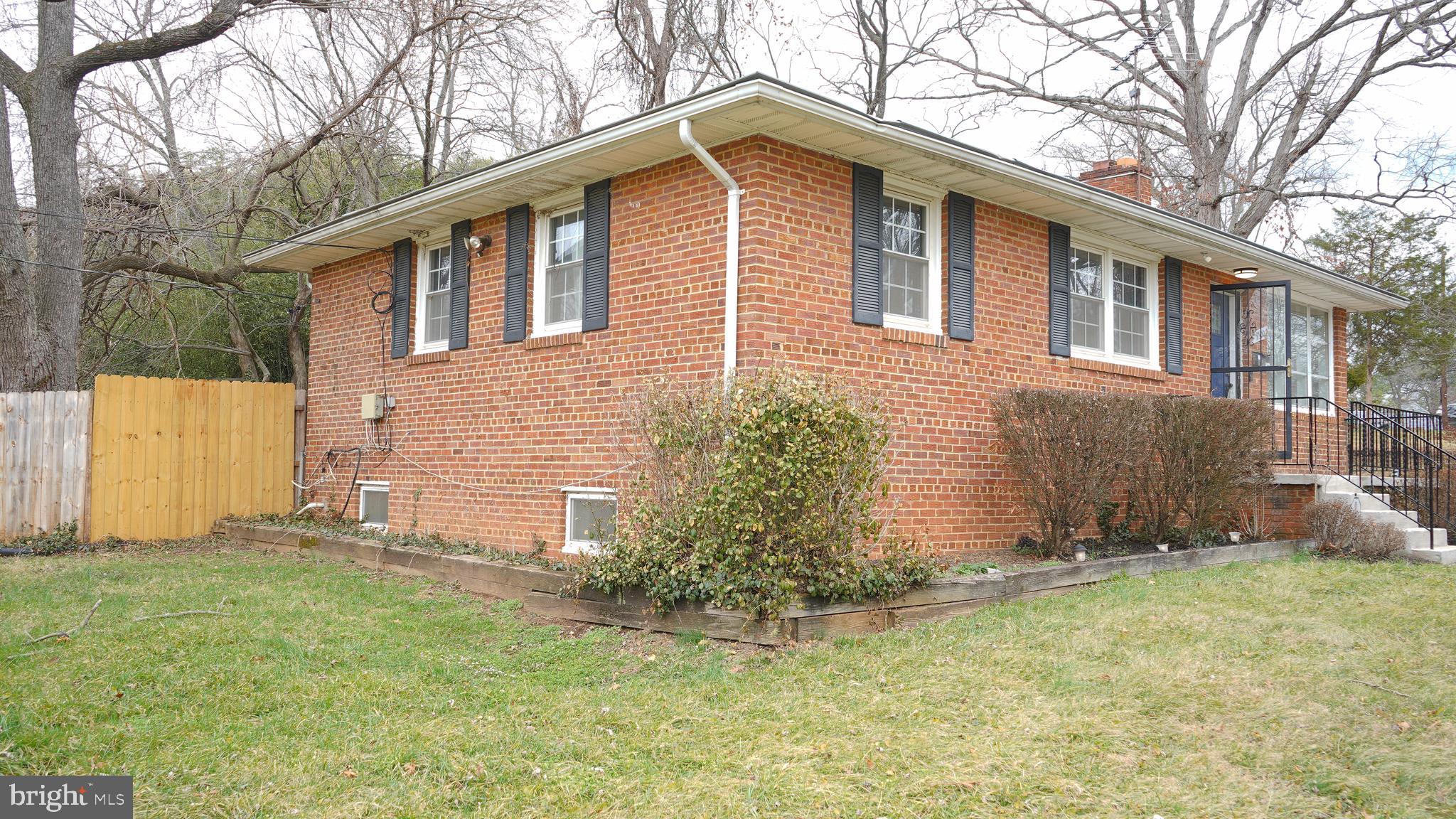9300 Worrell Avenue Lanham, MD 20706 - Photo 36 of 63 a front view of house with yard