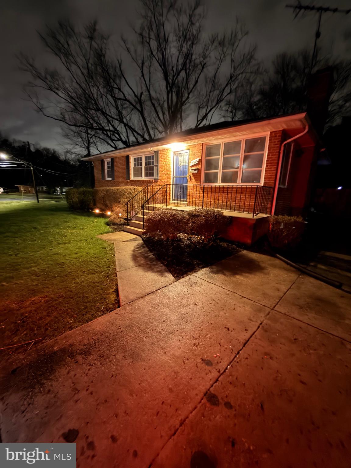 9300 Worrell Avenue Lanham, MD 20706 - Photo 38 of 63 a front view of a house with a yard