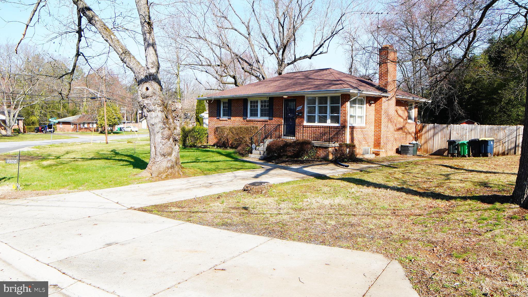 9300 Worrell Avenue Lanham, MD 20706 - Photo 44 of 63 a front view of a house with a yard