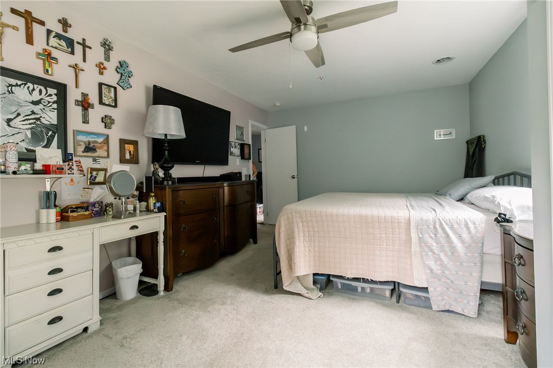 314 Buckeye Road Huron, OH 44839 - Photo 16 of 25 Carpeted bedroom featuring ceiling fan