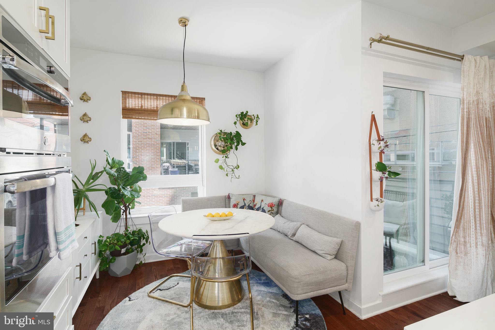 159 East Allen Street, Unit 1 Philadelphia, PA 19125 - Photo 26 of 45 a living room with furniture and a potted plant