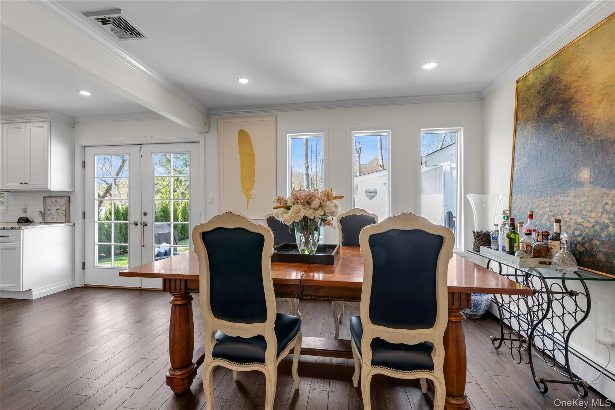 23 Grove Street Cold Spring Harbor, NY 11724 - Photo 6 of 21 a dining room with furniture window and wooden floor