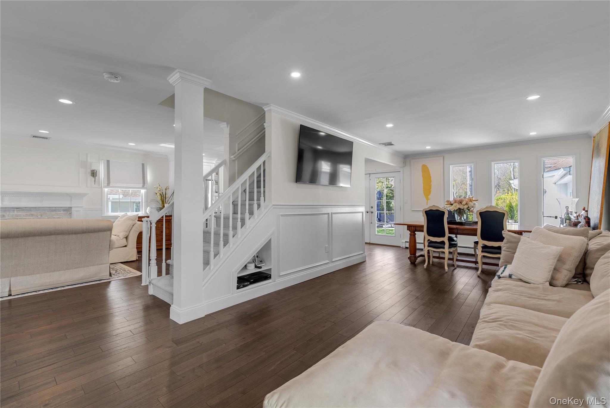 23 Grove Street Cold Spring Harbor, NY 11724 - Photo 10 of 21 a living room with furniture and a flat screen tv