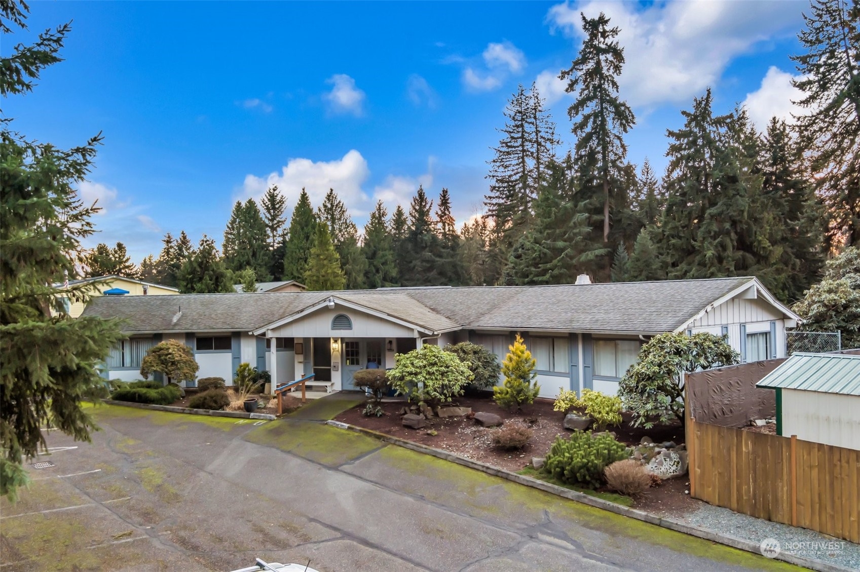 3324 206th Place Southeast Bothell, WA 98012 - Photo 31 of 34 a front view of a house with garden