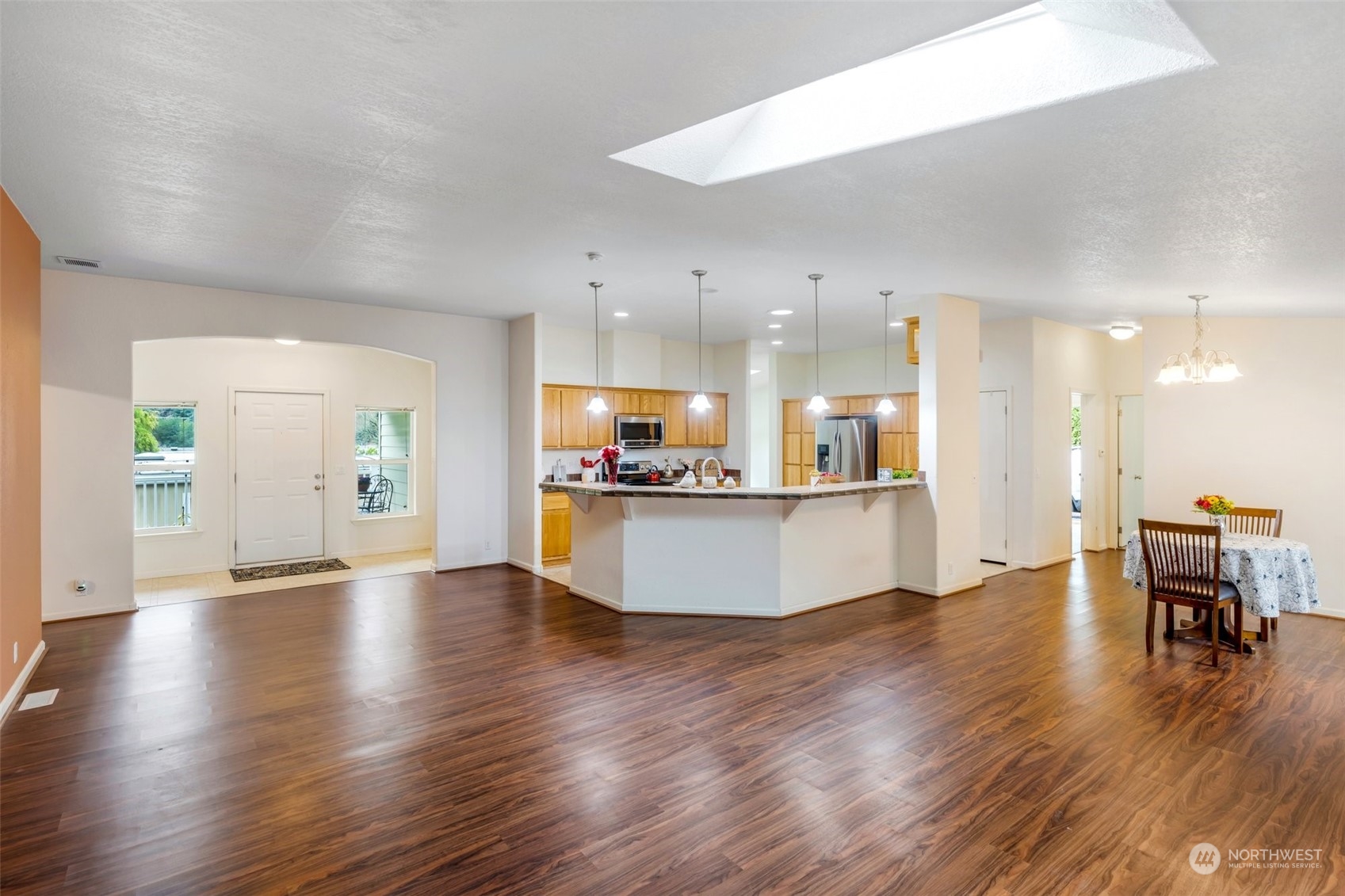 3324 206th Place Southeast Bothell, WA 98012 - Photo 6 of 34 a view of kitchen with cabinets and wooden floor
