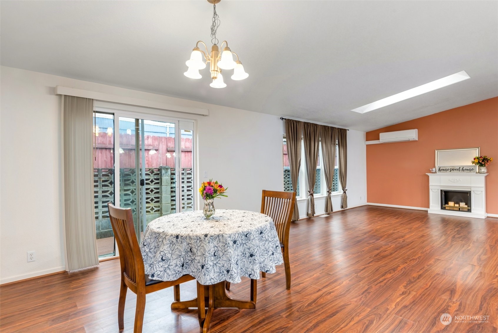3324 206th Place Southeast Bothell, WA 98012 - Photo 7 of 34 a view of a dining room with furniture window and wooden floor