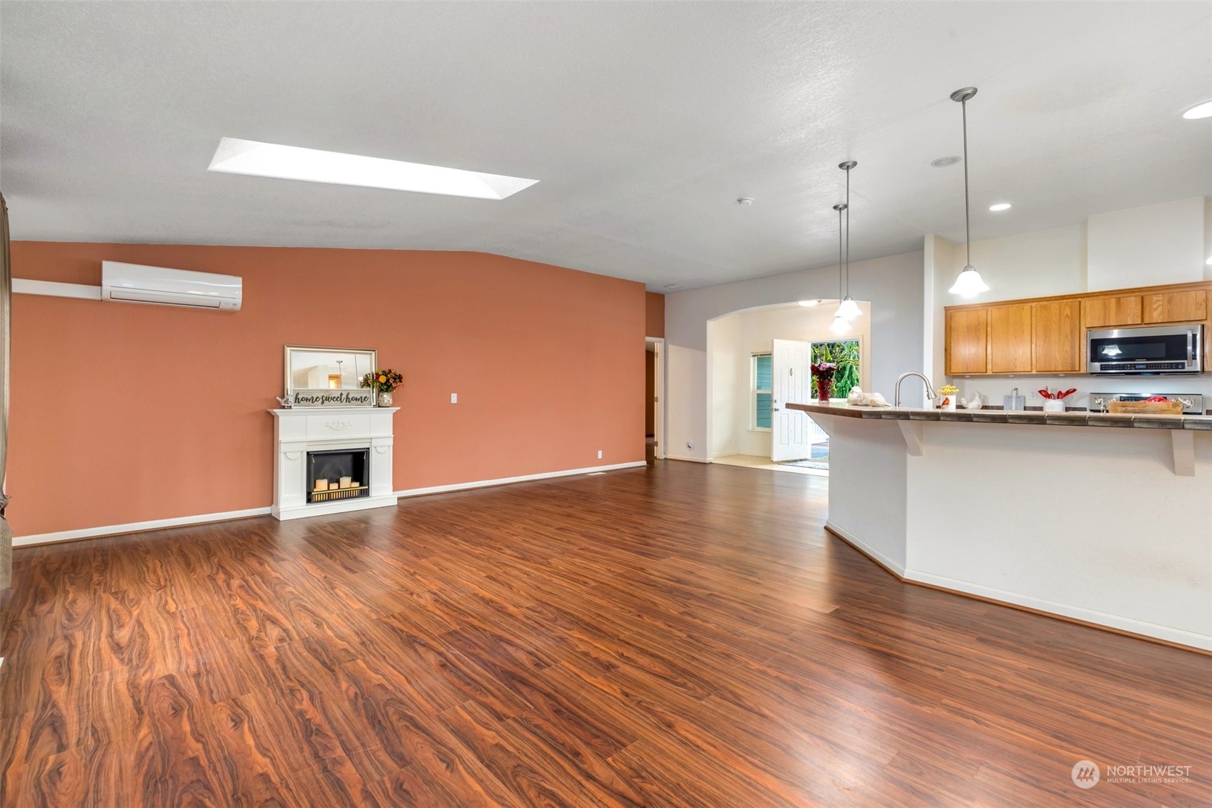 3324 206th Place Southeast Bothell, WA 98012 - Photo 8 of 34 a view of a kitchen with wooden floor and a sink