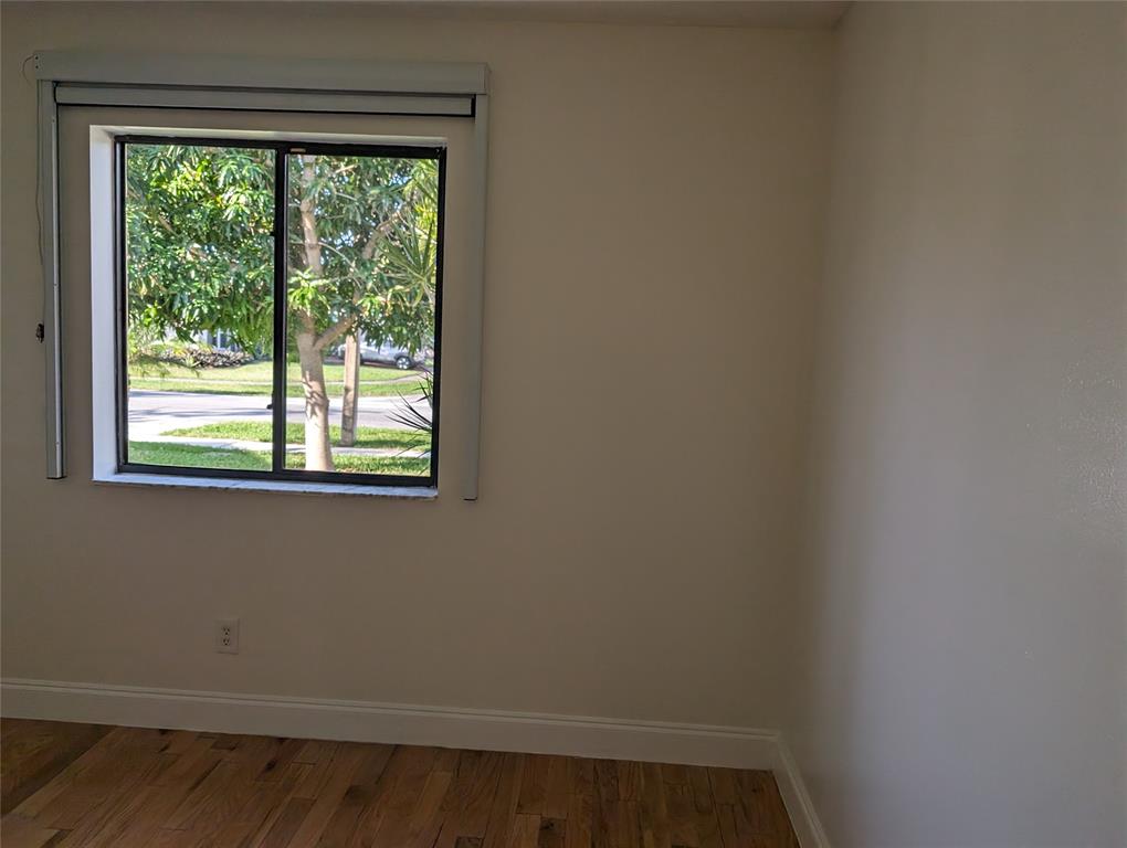 707 Southeast 3rd Avenue Dania Beach, FL 33004 - Photo 17 of 26 a small space with a window