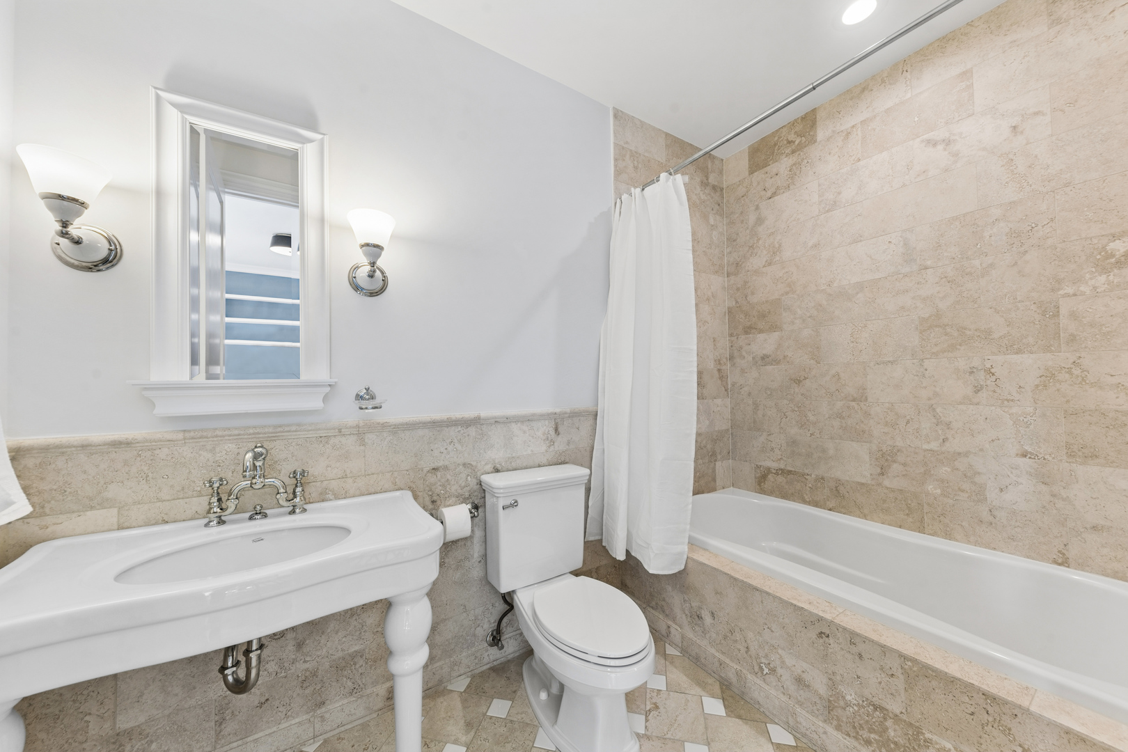 1460 West Byron Street Chicago, IL 60613 - Photo 16 of 33 a bathroom with a sink toilet and shower