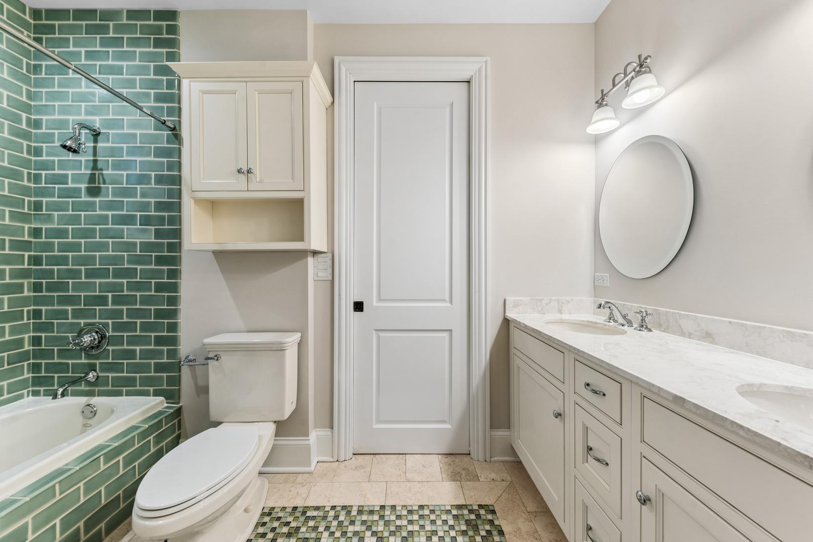 1460 West Byron Street Chicago, IL 60613 - Photo 18 of 33 a bathroom with a toilet a sink a mirror a bathtub and shower