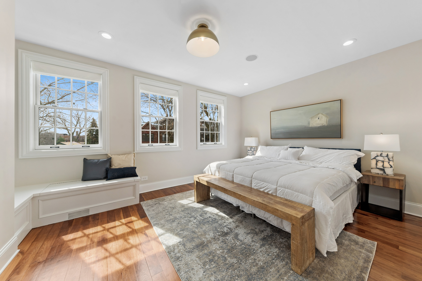 1460 West Byron Street Chicago, IL 60613 - Photo 25 of 33 a bedroom with a large bed and a window