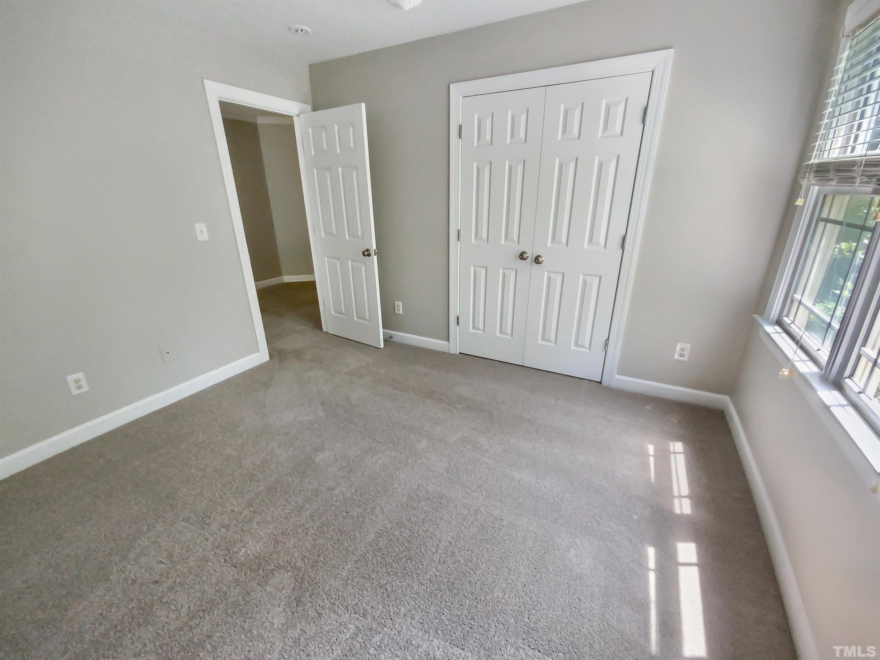 2106 Cloud Cover Lane Raleigh, NC 27614 - Photo 9 of 21 an empty room with windows