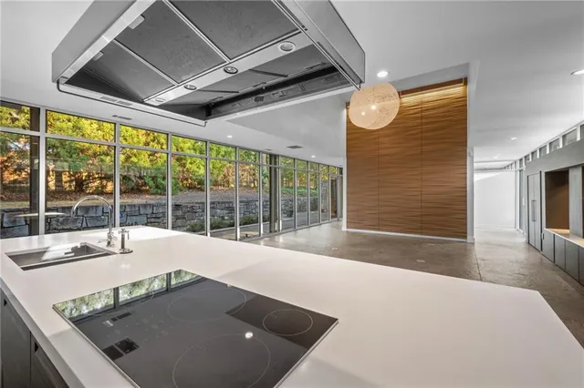 a view of a room with a large window