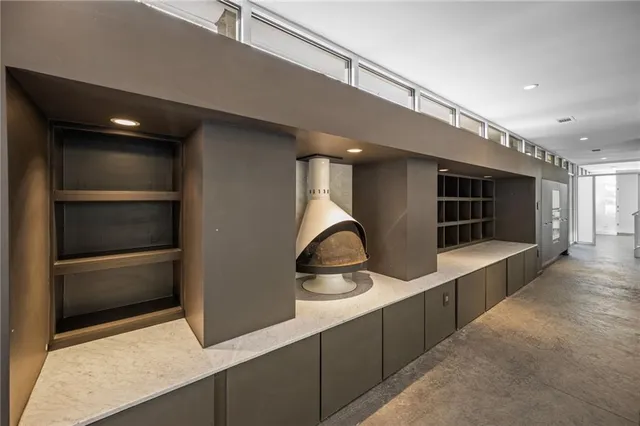 a kitchen with a sink and refrigerator