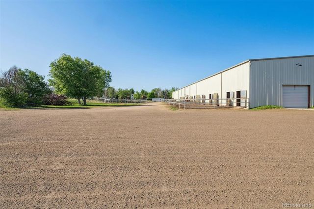 a view of an empty room with a garage