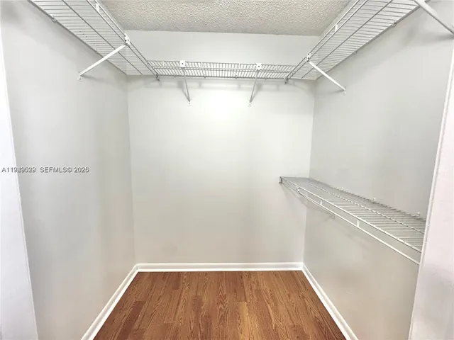 a view of a room with racks on the wall