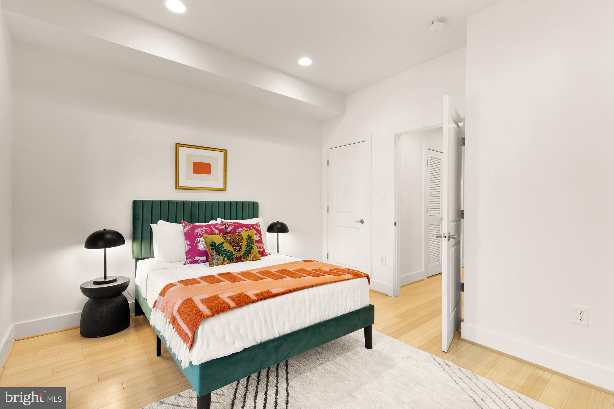 57 Bryant Street Northwest, Unit 2 Washington, DC 20001 - Photo 16 of 36 a bedroom with a bed and a window