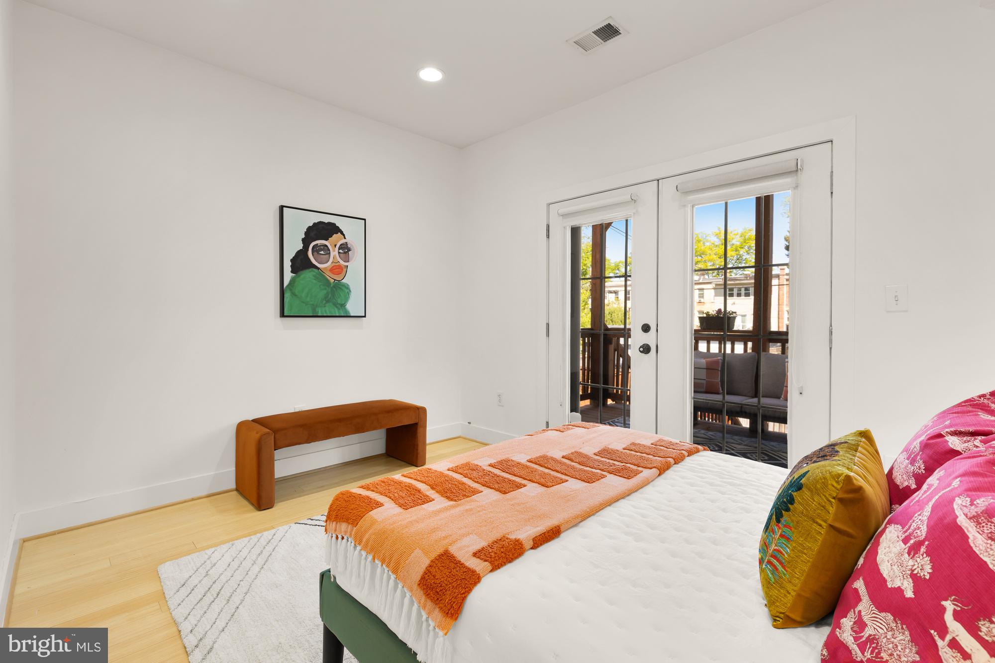 57 Bryant Street Northwest, Unit 2 Washington, DC 20001 - Photo 18 of 36 a bedroom with two beds and painted walls