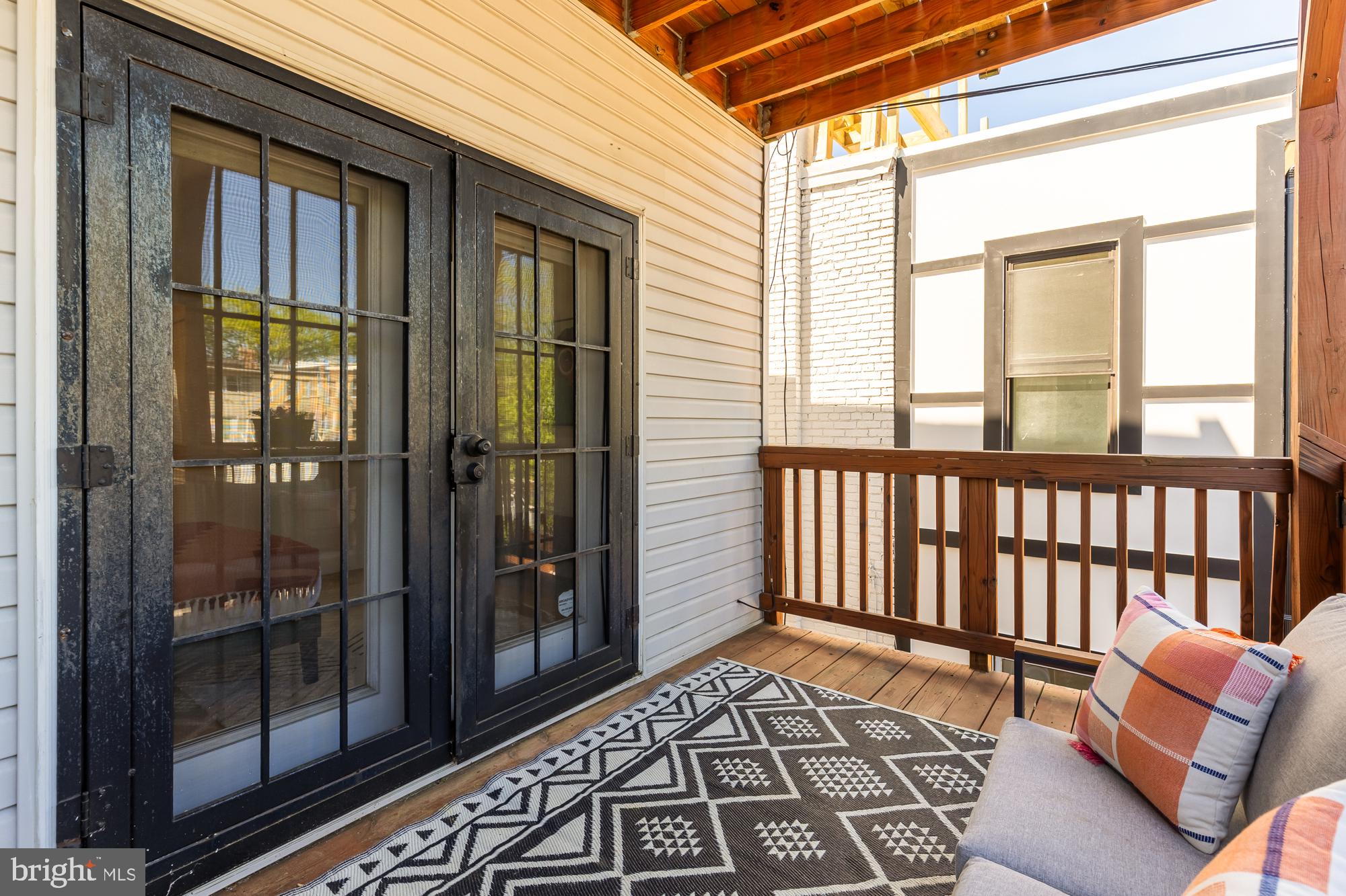 57 Bryant Street Northwest, Unit 2 Washington, DC 20001 - Photo 24 of 36 a view of a balcony with furniture