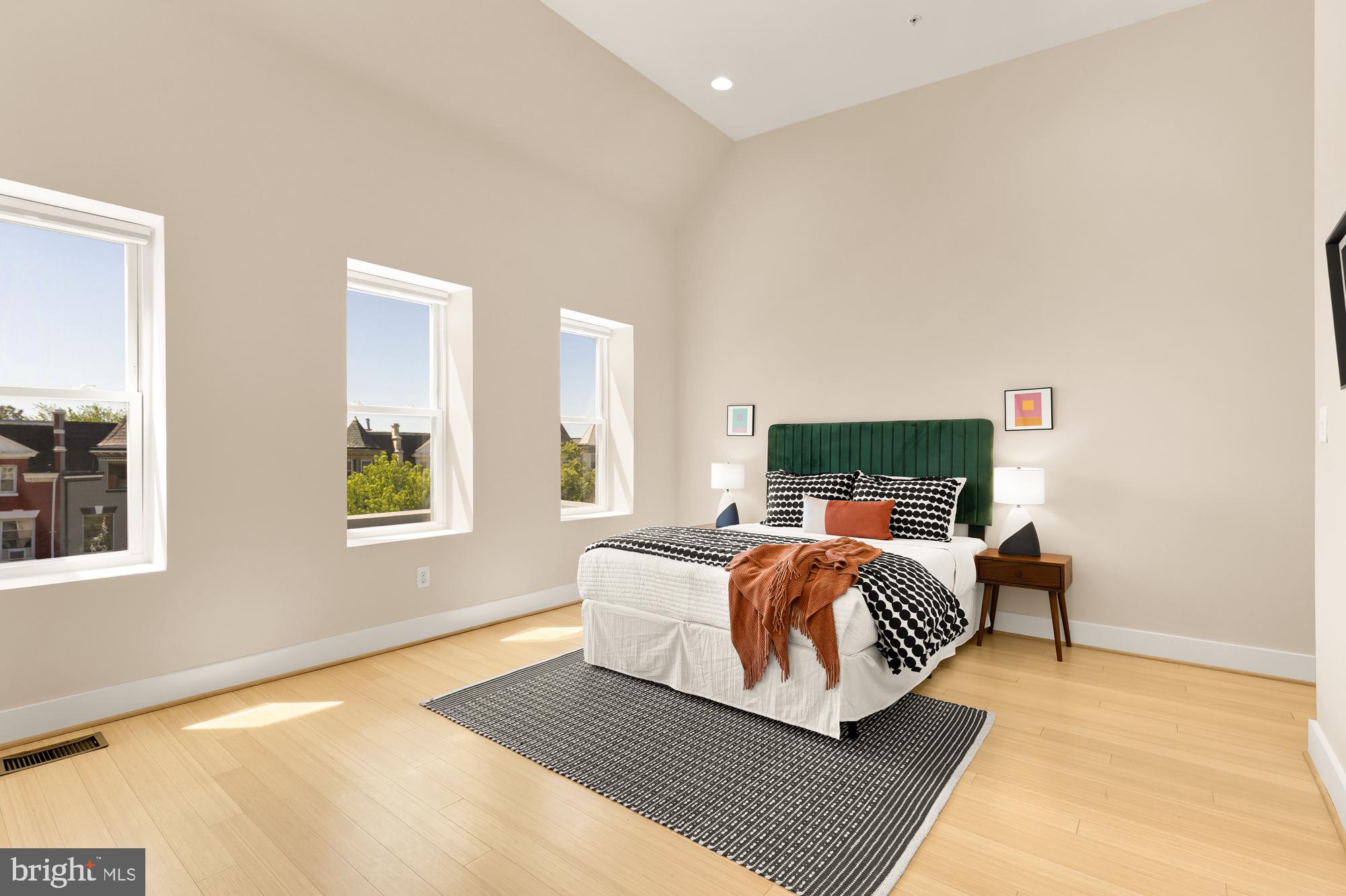 57 Bryant Street Northwest, Unit 2 Washington, DC 20001 - Photo 25 of 36 a bedroom with bed and window