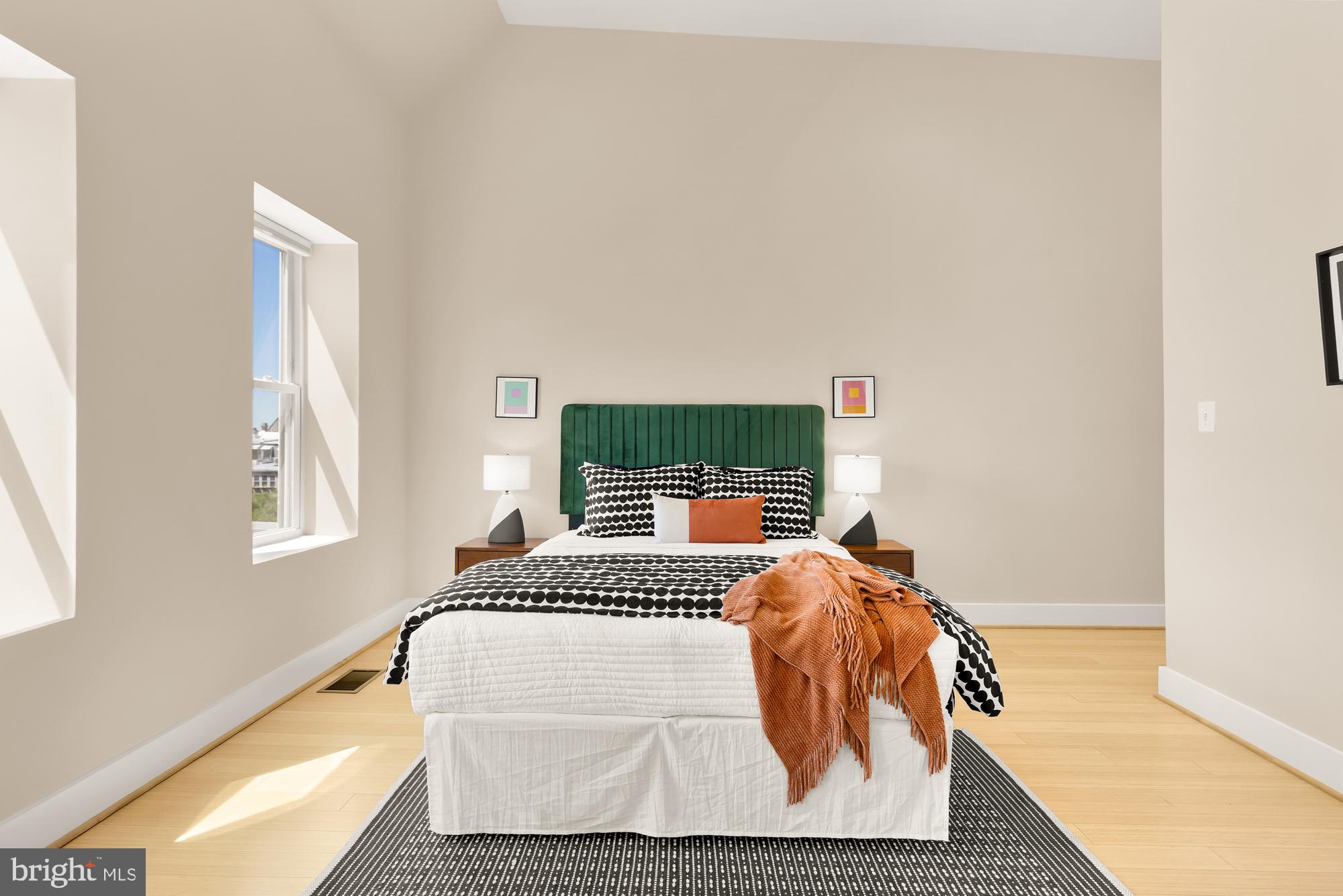 57 Bryant Street Northwest, Unit 2 Washington, DC 20001 - Photo 26 of 36 a bedroom with a bed and window