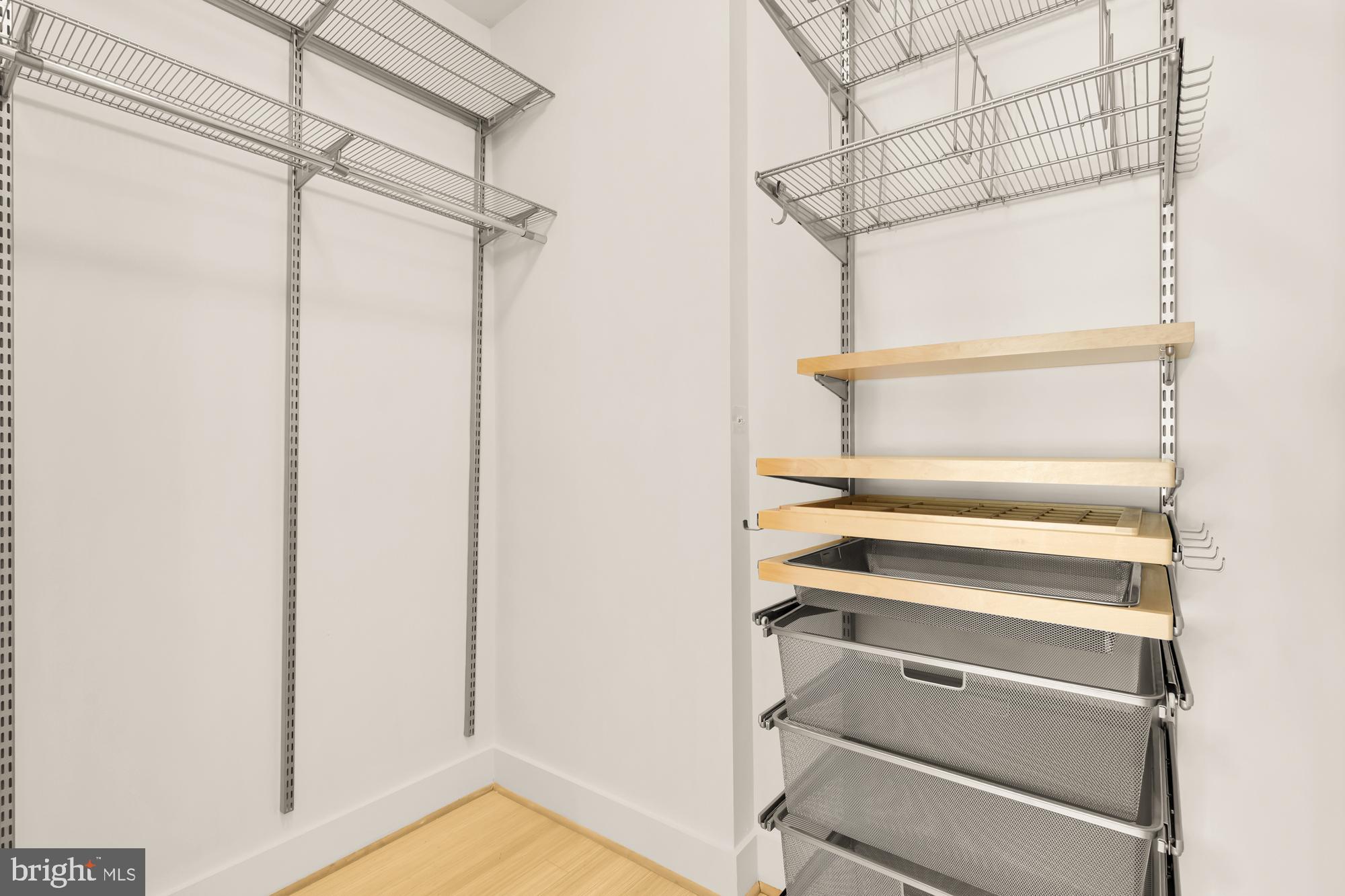 57 Bryant Street Northwest, Unit 2 Washington, DC 20001 - Photo 35 of 36 a view of walk in closet with empty racks
