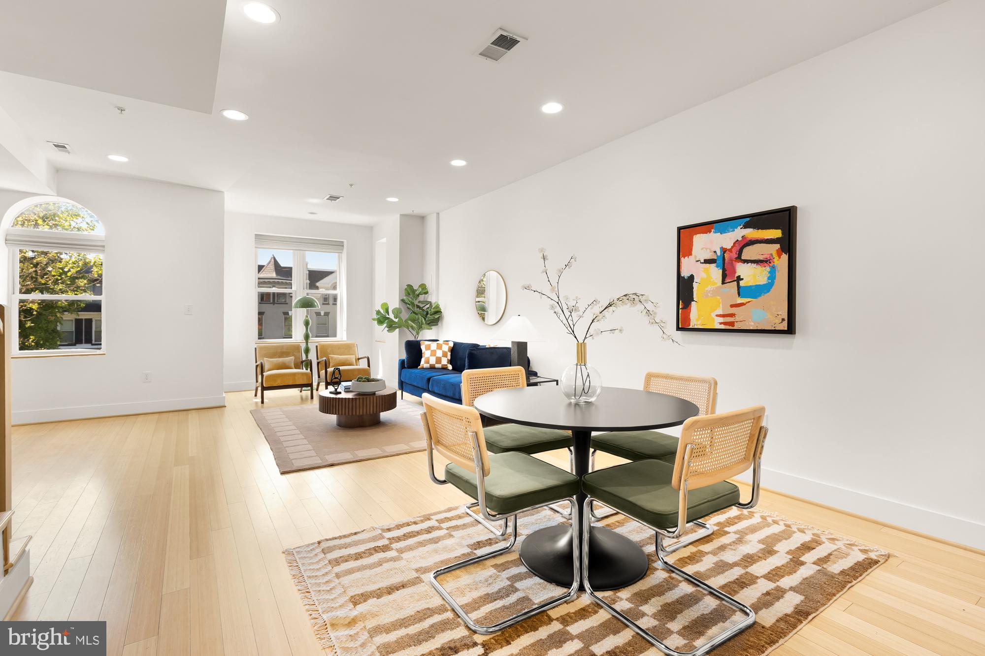 57 Bryant Street Northwest, Unit 2 Washington, DC 20001 - Photo 5 of 36 a living room with furniture and a rug
