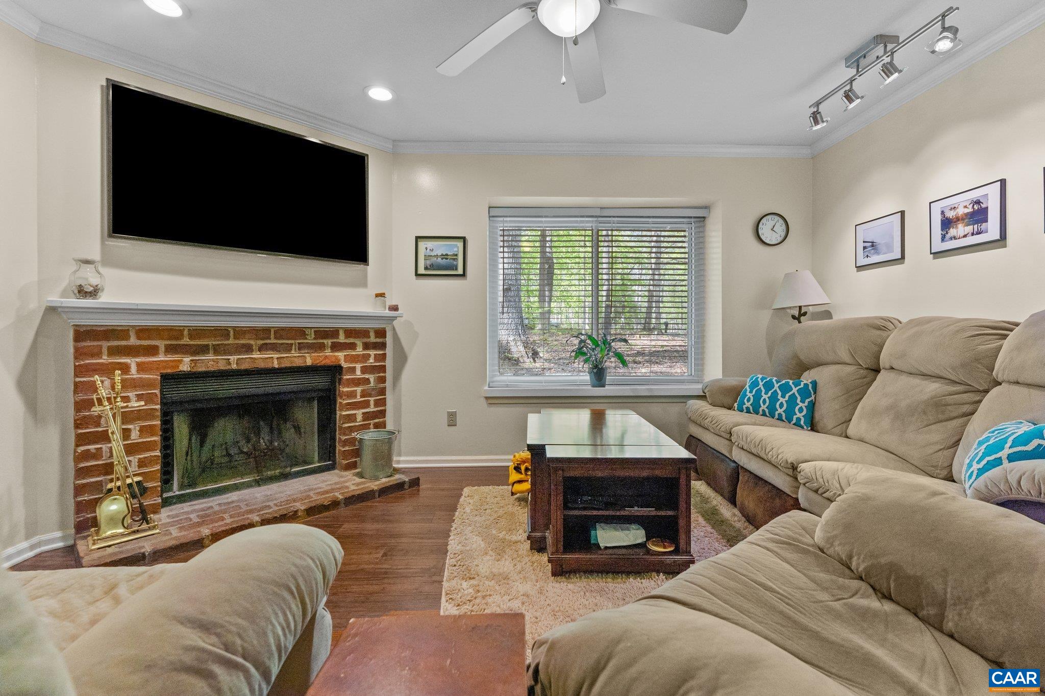 1185 Hunters Ridge Road Earlysville, VA 22936 - Photo 3 of 33 a living room with furniture and a fireplace