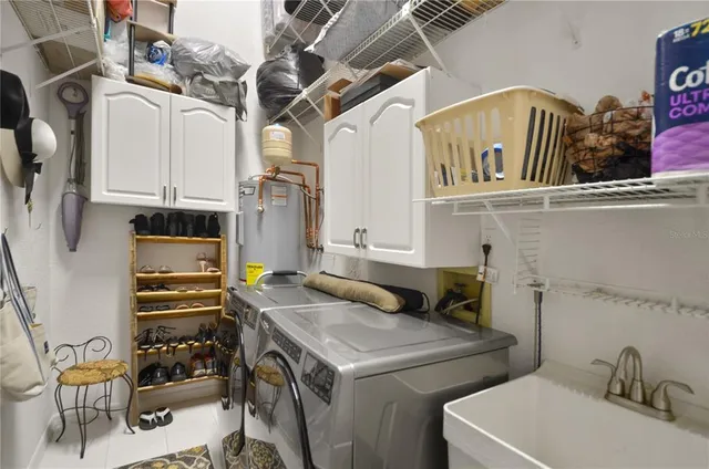 a utility room with dryer and washer