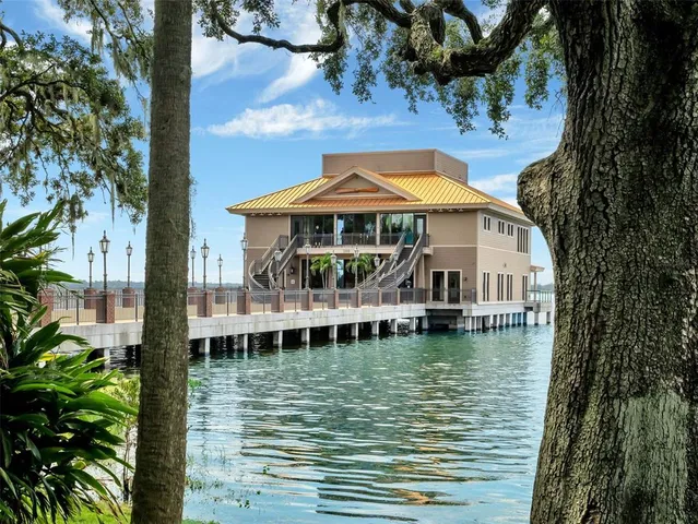 a front view of a house with a boat